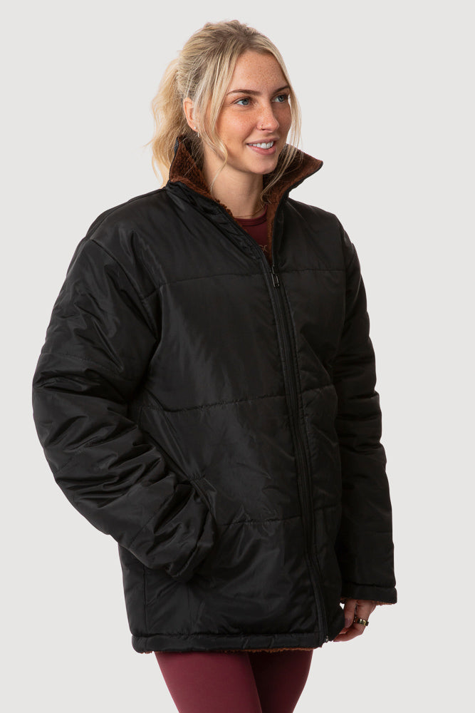 Women wearing  Reversible unisex jacket black nylon brown teddy fleece - INNER EGO